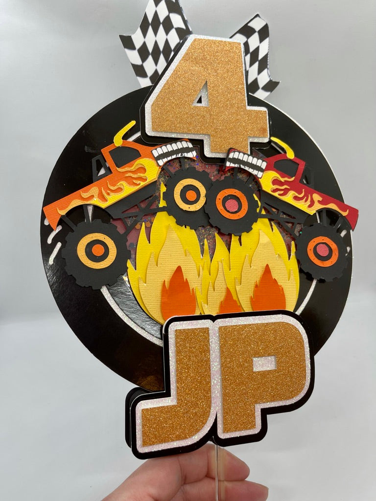 Custom monster jam cake topper with two toro locos with child's name and age