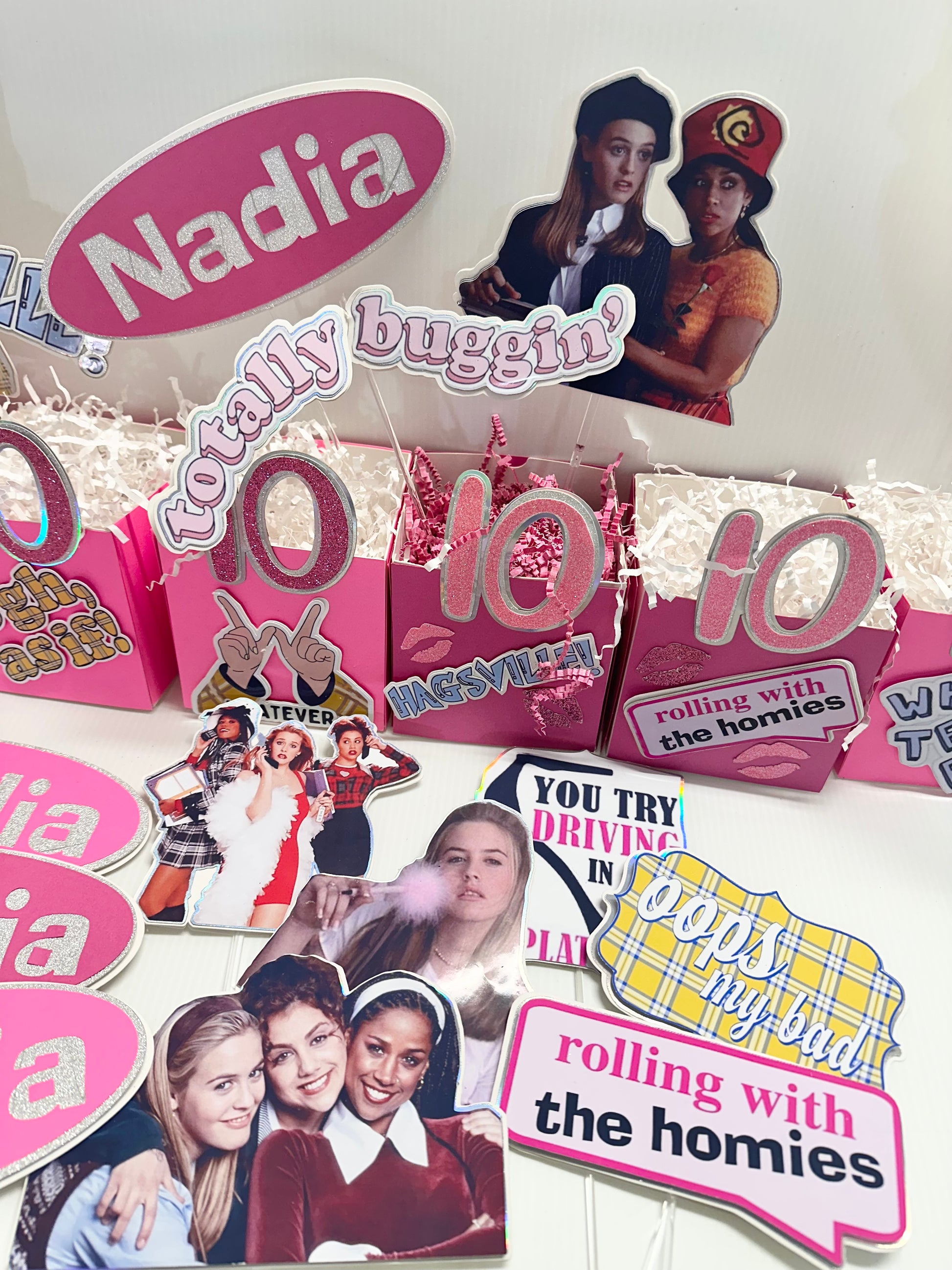 Custom centerpieces titled 'Clueless Movie 90s Theme Party Centerpieces'