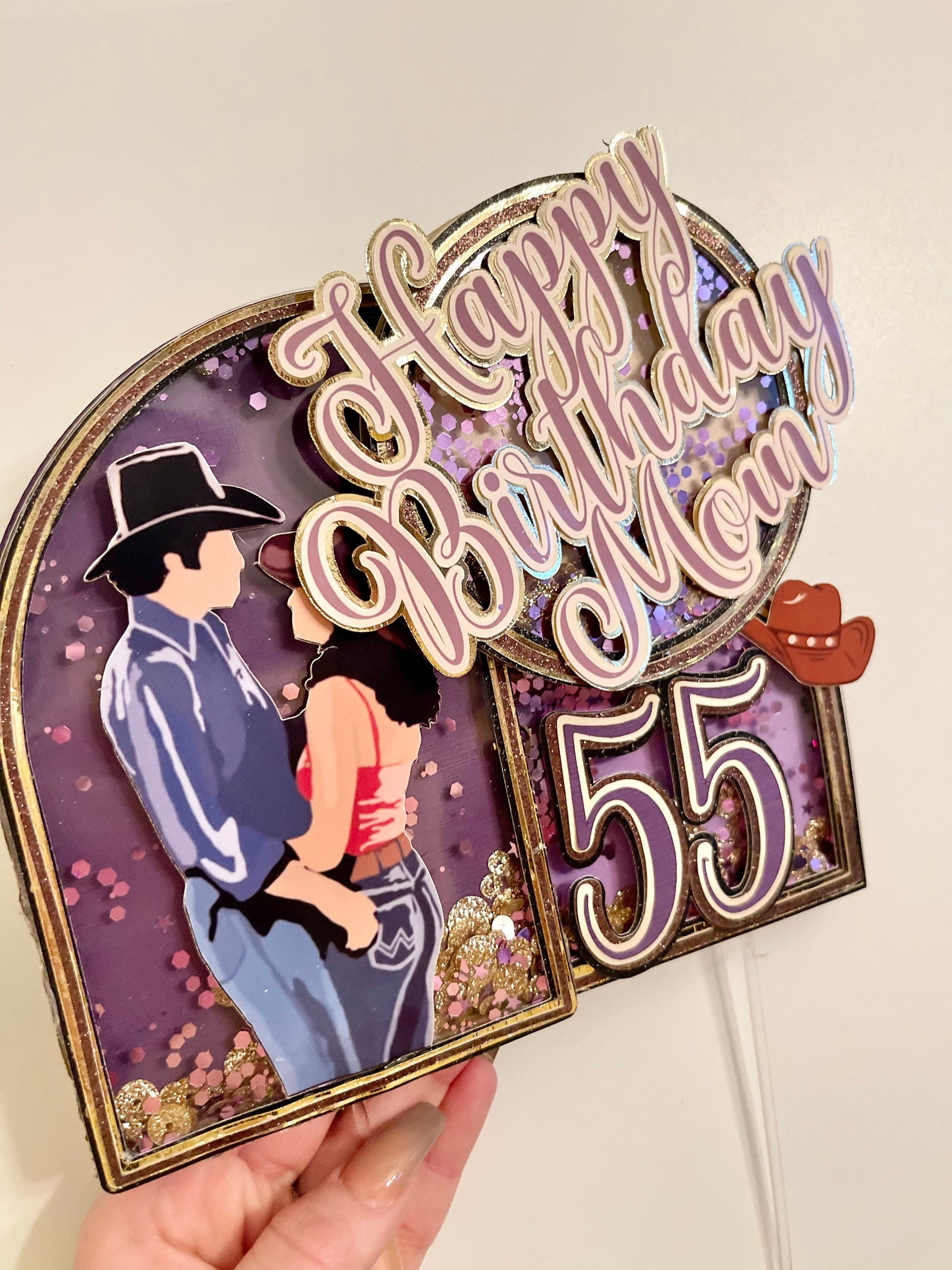 Custom urban cowboy movie theme cake topper with "Happy Birthday" in purple and gold